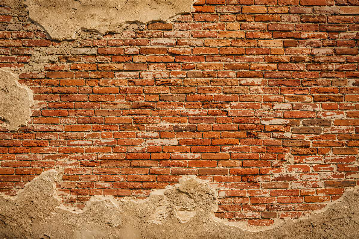 Fotobehang zwaar ingestorte bakstenen muur