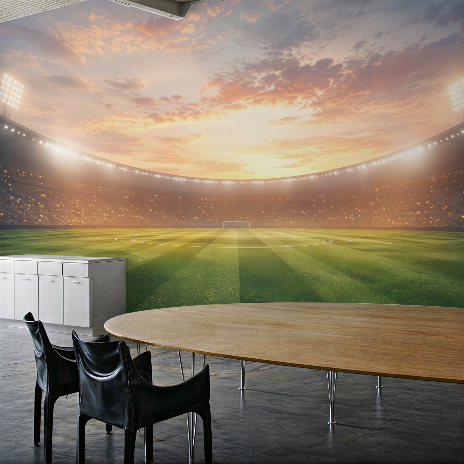 Fotobehang voetbalstadion bij zonsondergang met groen gras
