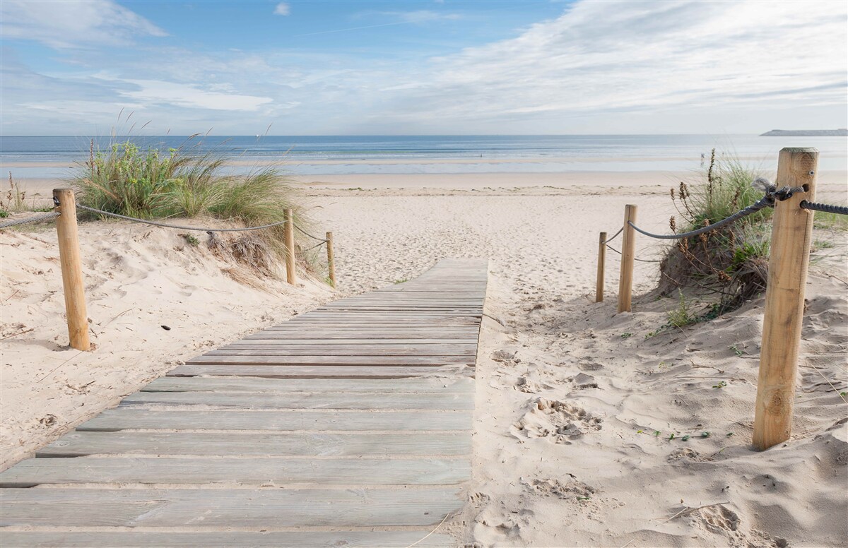 Fotobehang zandpad naar de zee