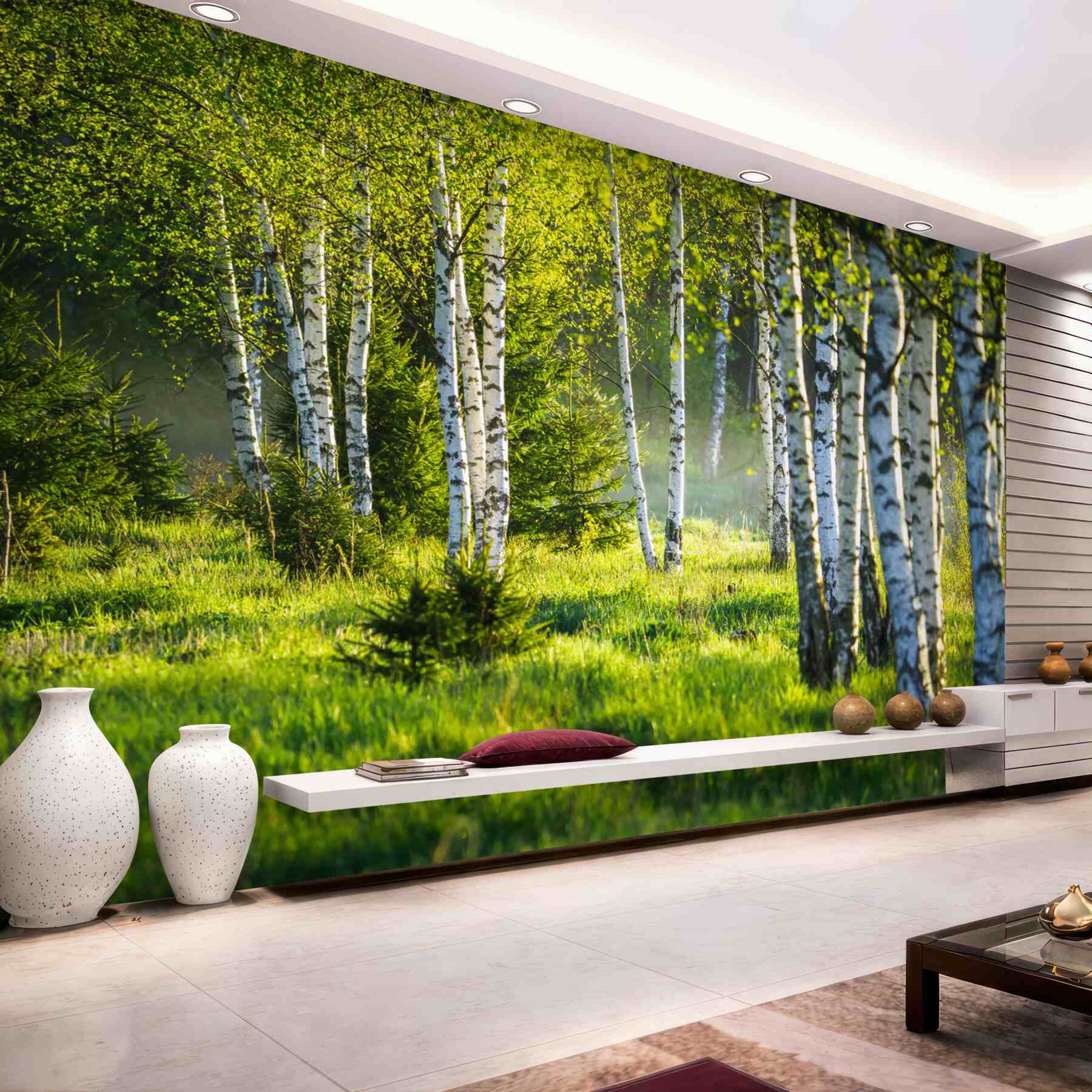 Fotobehang groene weiden met slanke berken