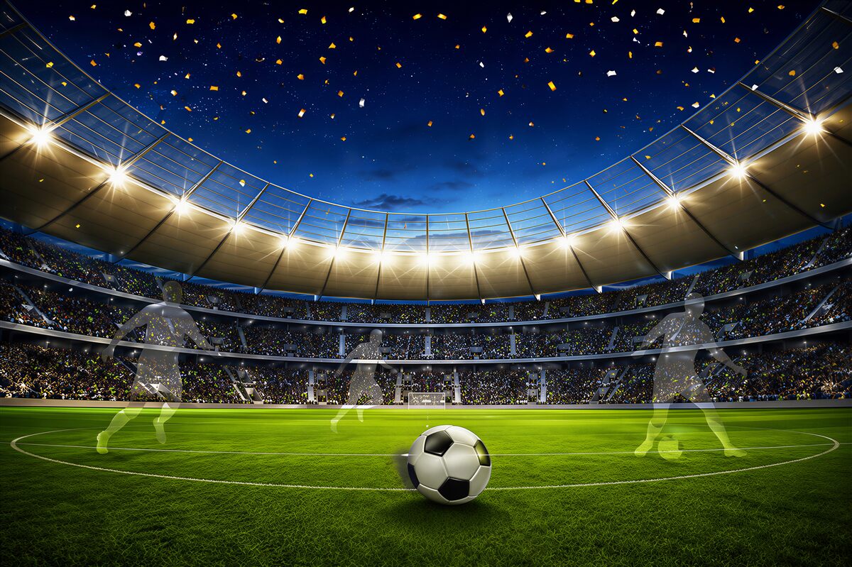 Fotobehang voetbalstadion met bal bij zonsondergang voor de kamer van een voetbalfan