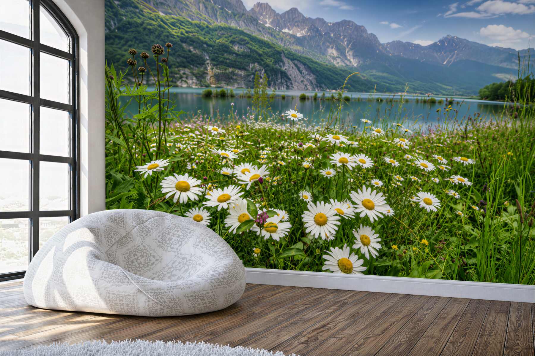 Fotobehang berglandschap met een margrietenveld